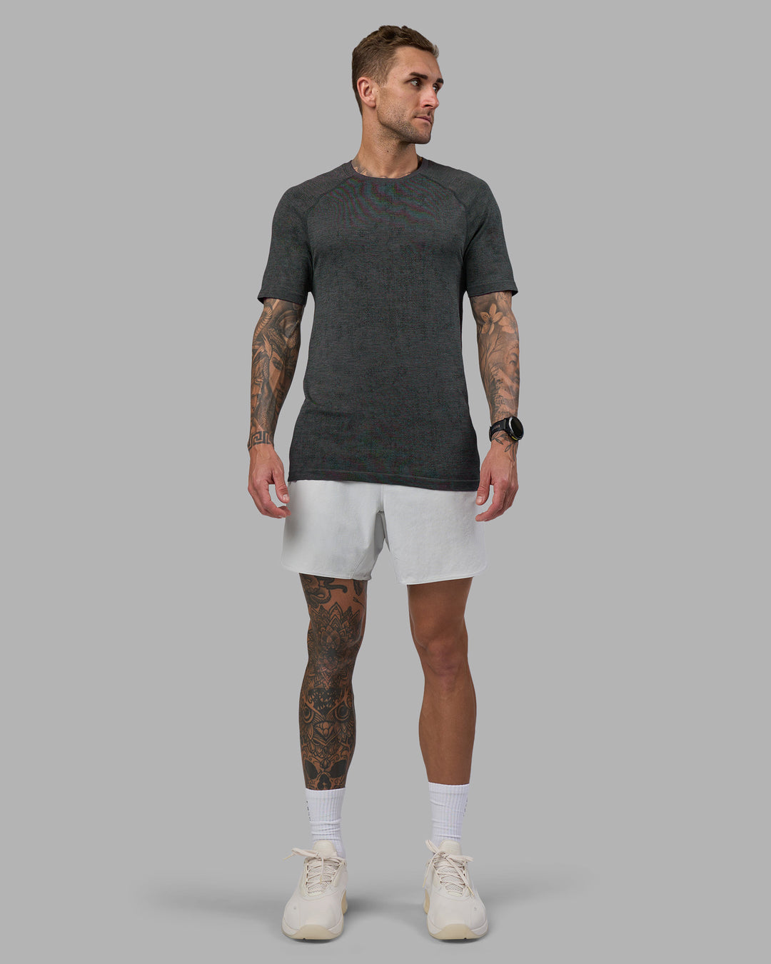 Man wearing AeroFLX+ Seamless Tee - Black Camo-Graphite | Model:Tommy | Size:L