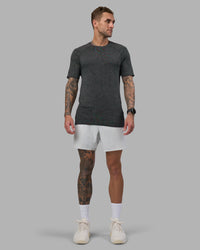 Man wearing AeroFLX+ Seamless Tee - Black Camo-Graphite | Model:Tommy | Size:L