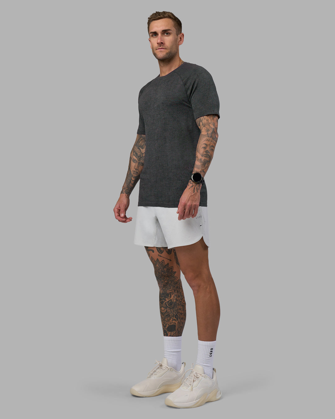 Man wearing AeroFLX+ Seamless Tee - Black Camo-Graphite | Model:Tommy | Size:L