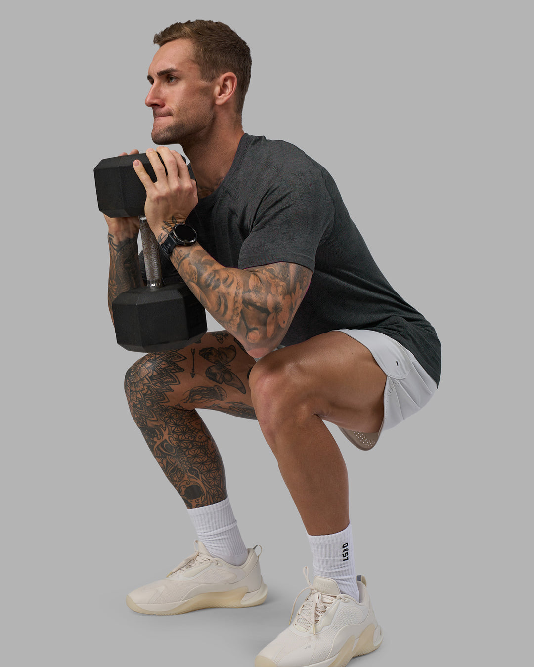 Man wearing AeroFLX+ Seamless Tee - Black Camo-Graphite | Model:Tommy | Size:L