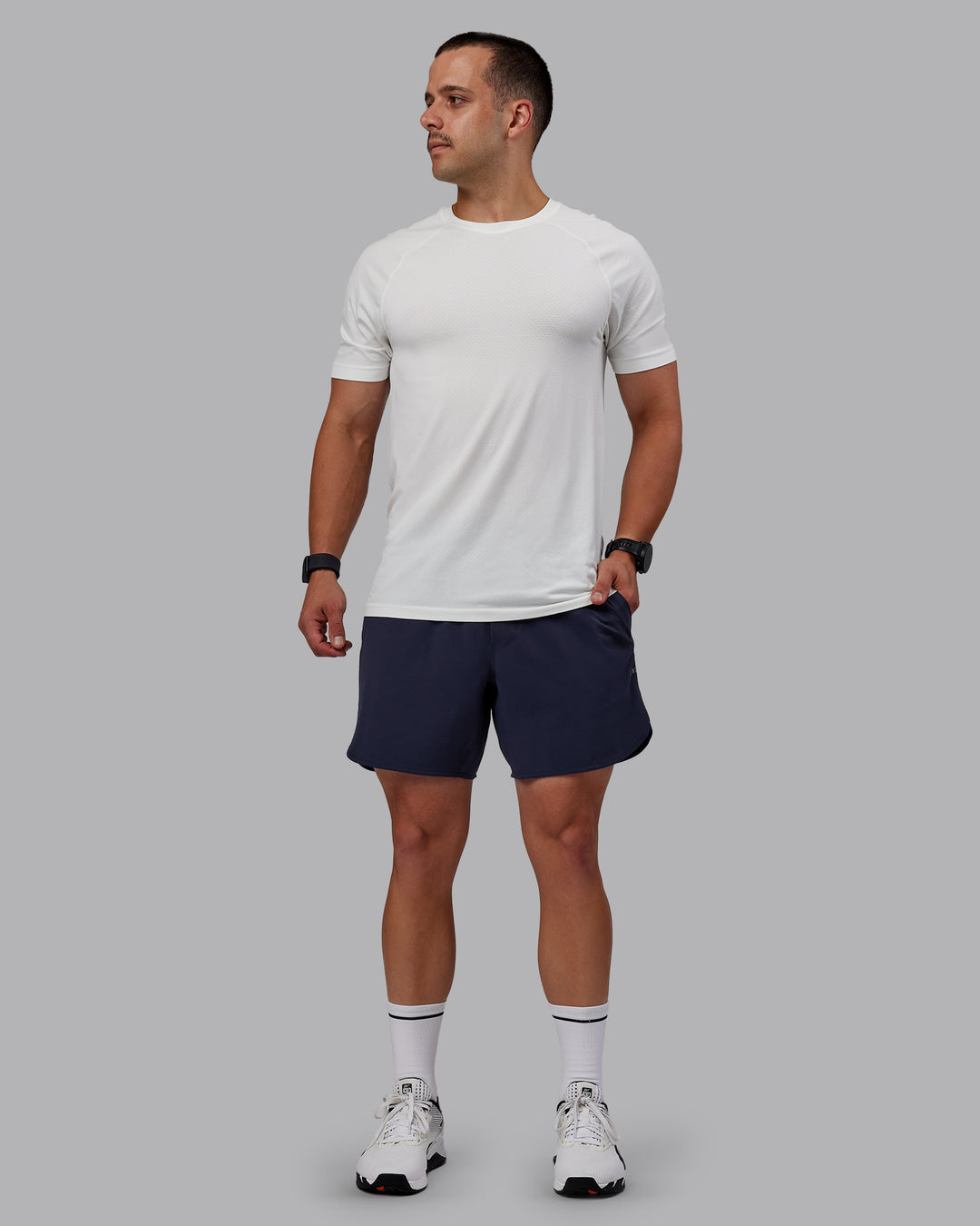 Man wearing AeroFLX+ Seamless Tee - Off White/Off White Marl