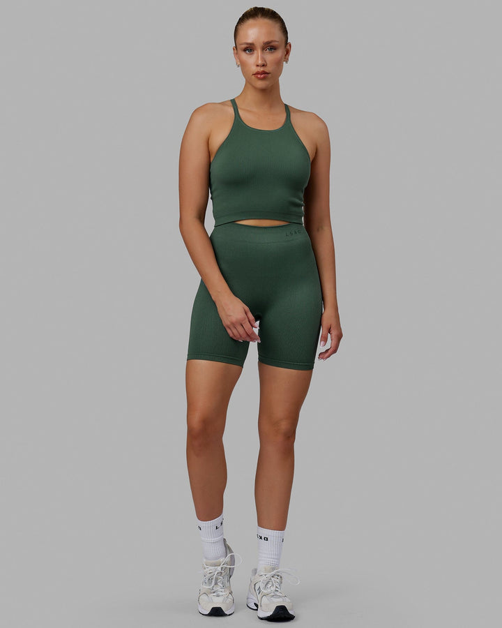 Woman wearing Minimal Seamless Crop Ribbed Tank - Dark Forest