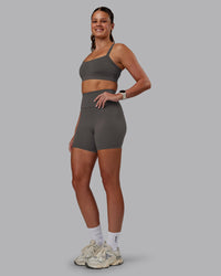 Woman wearing Momentum Sports Bra - Dark Storm | Model:Phoebe | Size:S