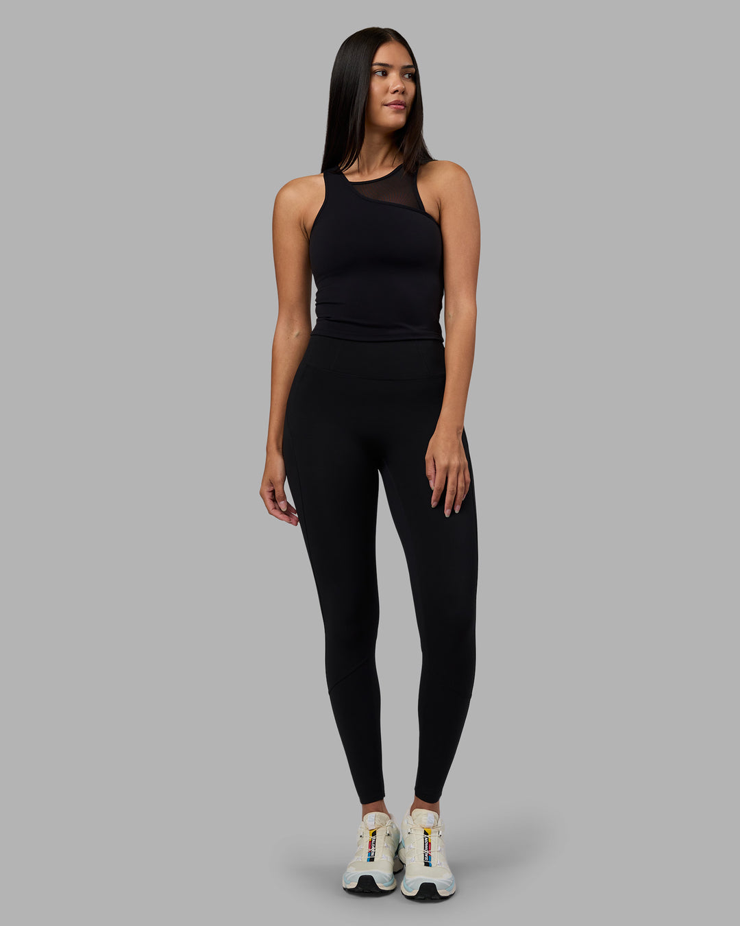 Woman wearing Motion Mesh Shelf Bra Tank - Black | Model:Rhiley | Size:S