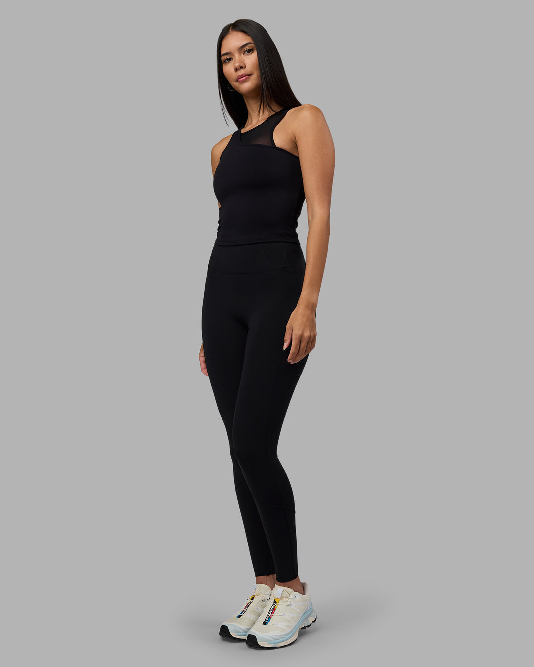 Woman wearing Motion Mesh Shelf Bra Tank - Black | Model:Rhiley | Size:S