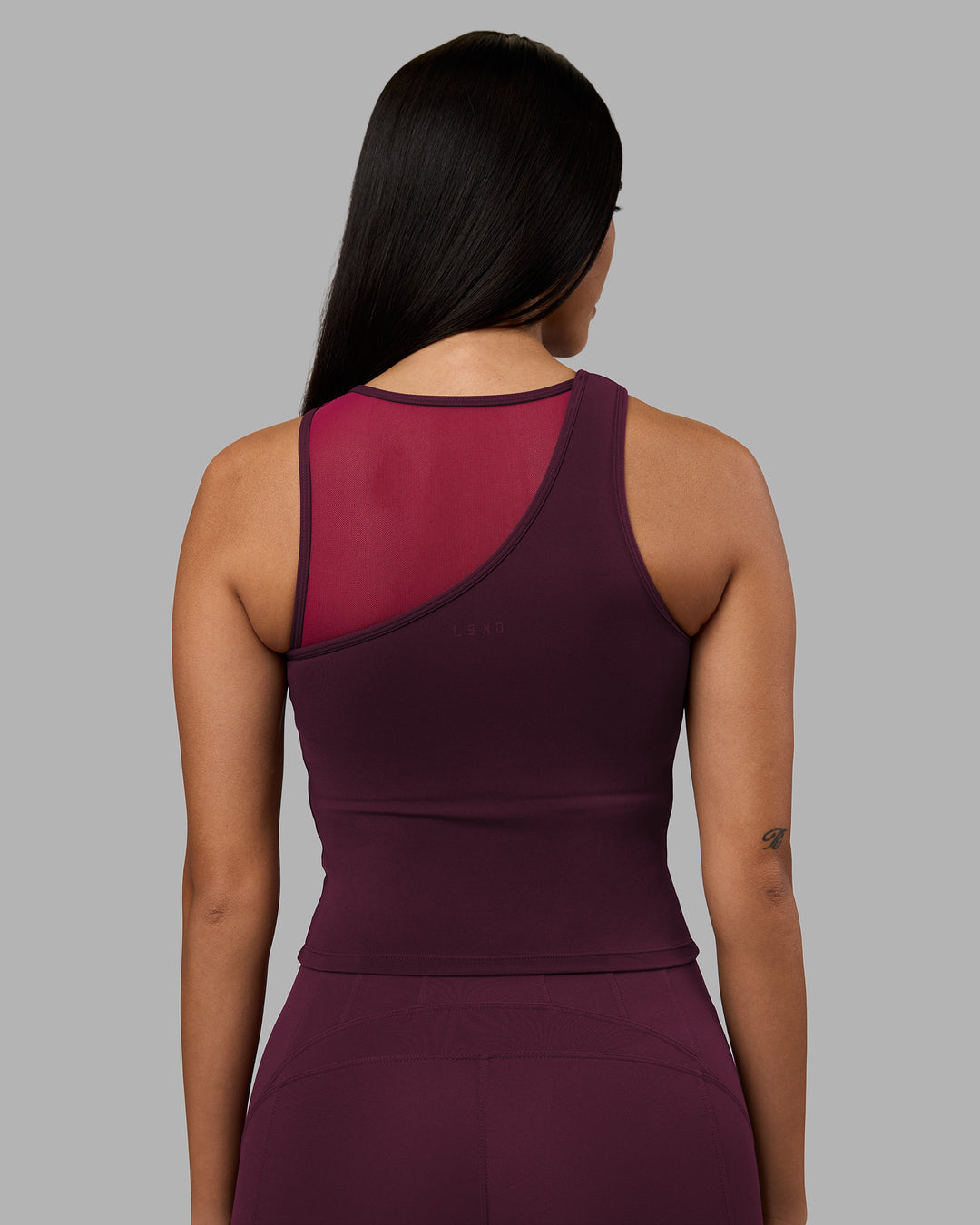 Woman wearing Motion Mesh Shelf Bra Tank - Cherry Lacquer/Plum Berry | Model:Rhiley | Size:S