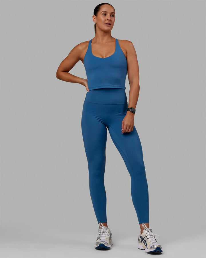 Woman wearing Movement Active Tank - High Tide