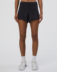 Woman wearing Movement CloudFLX 3" Short - Black | Model:Tomi | Size:S