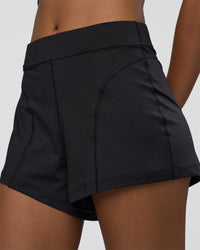 Woman wearing Movement CloudFLX 3" Short - Black | Model:Tomi | Size:S