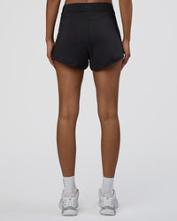 Woman wearing Movement CloudFLX 3" Short - Black | Model:Tomi | Size:S