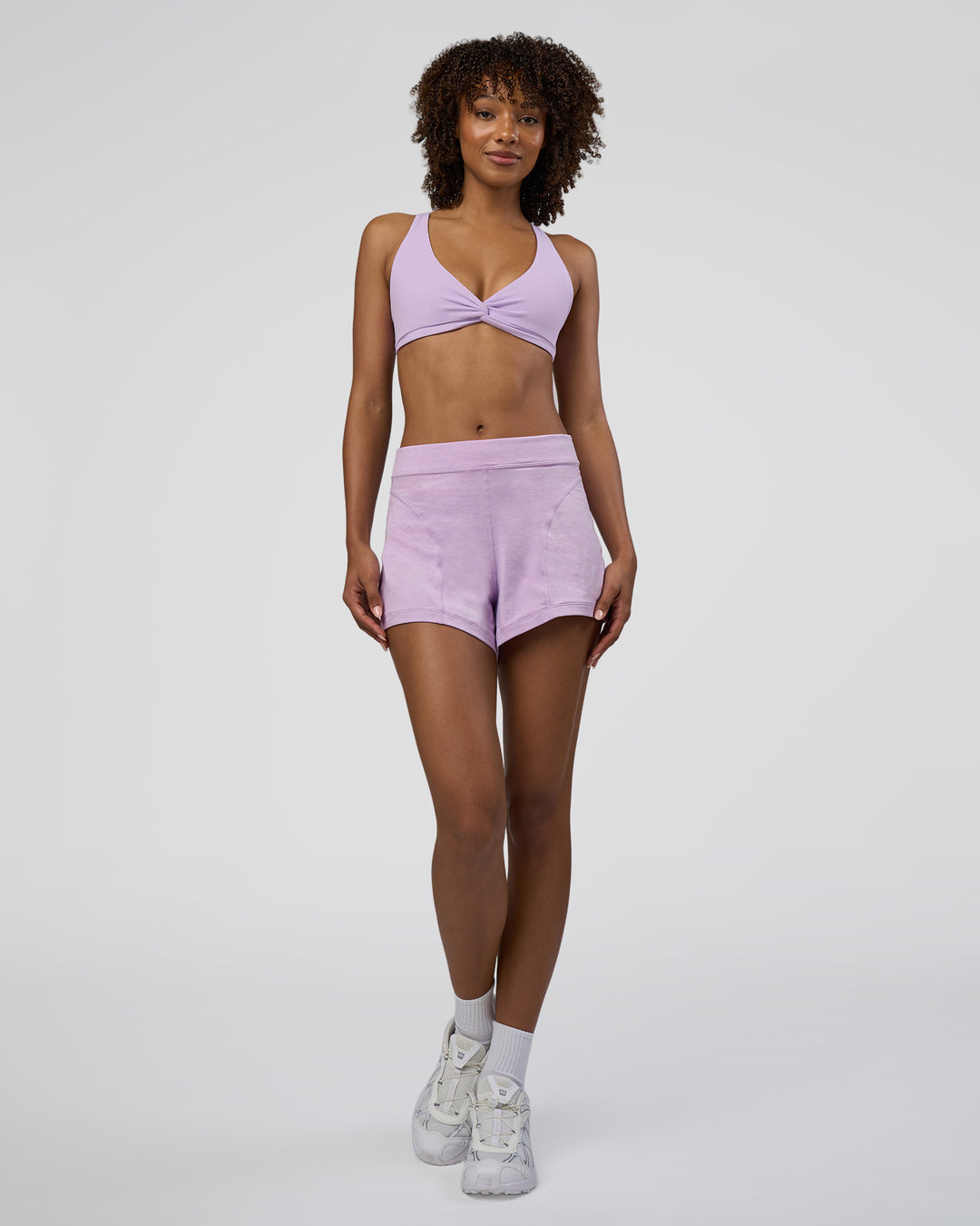 Woman wearing Movement CloudFLX 3&quot; Short - Orchid Bloom Marl | Model:Tomi | Size:S