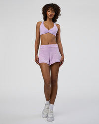 Woman wearing Movement CloudFLX 3" Short - Orchid Bloom Marl | Model:Tomi | Size:S