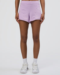 Woman wearing Movement CloudFLX 3" Short - Orchid Bloom Marl | Model:Tomi | Size:S