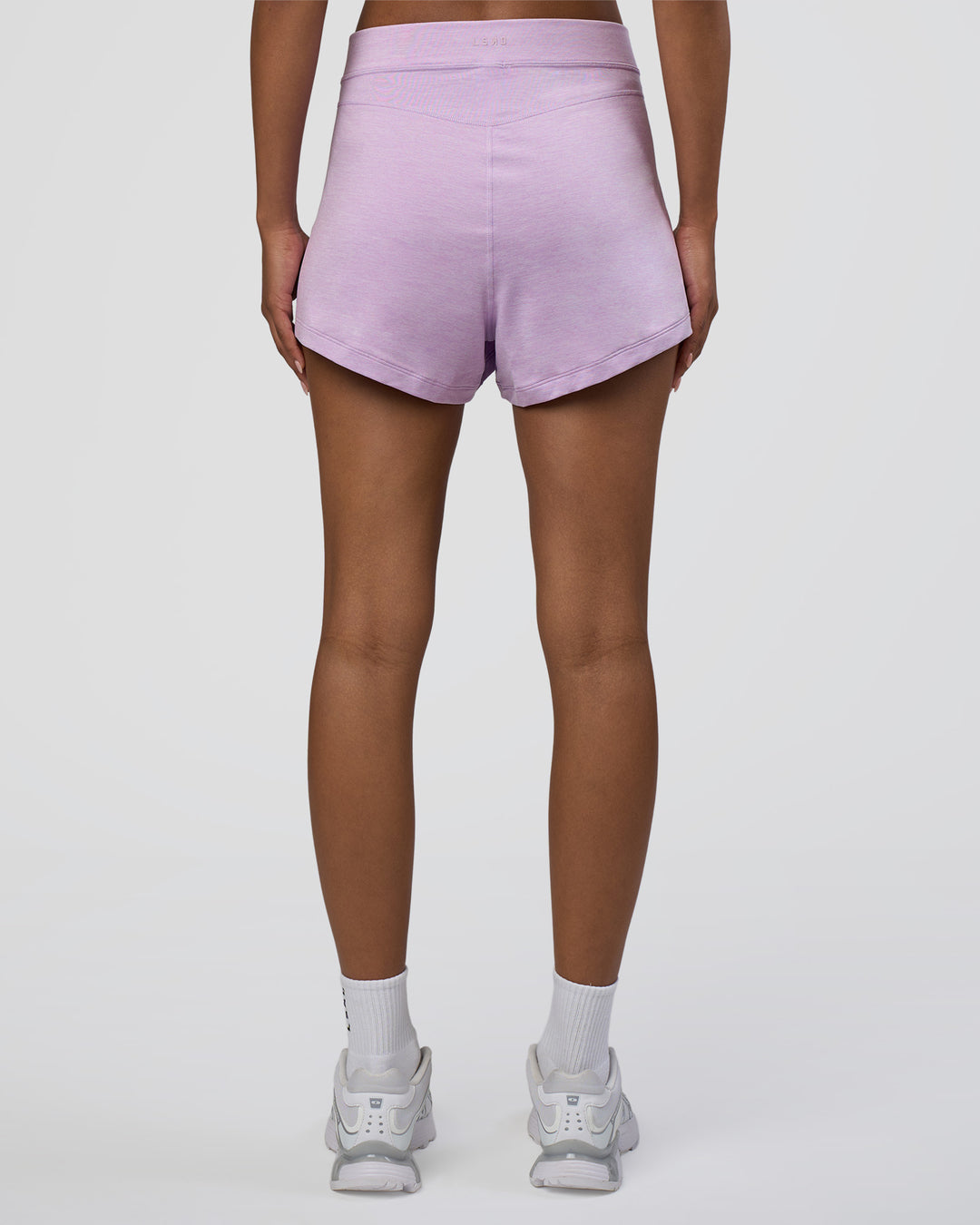 Woman wearing Movement CloudFLX 3&quot; Short - Orchid Bloom Marl | Model:Tomi | Size:S