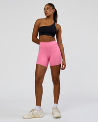 Woman wearing Muse Asymmetric Sports bra - Black | Model:Rosie | Size:S