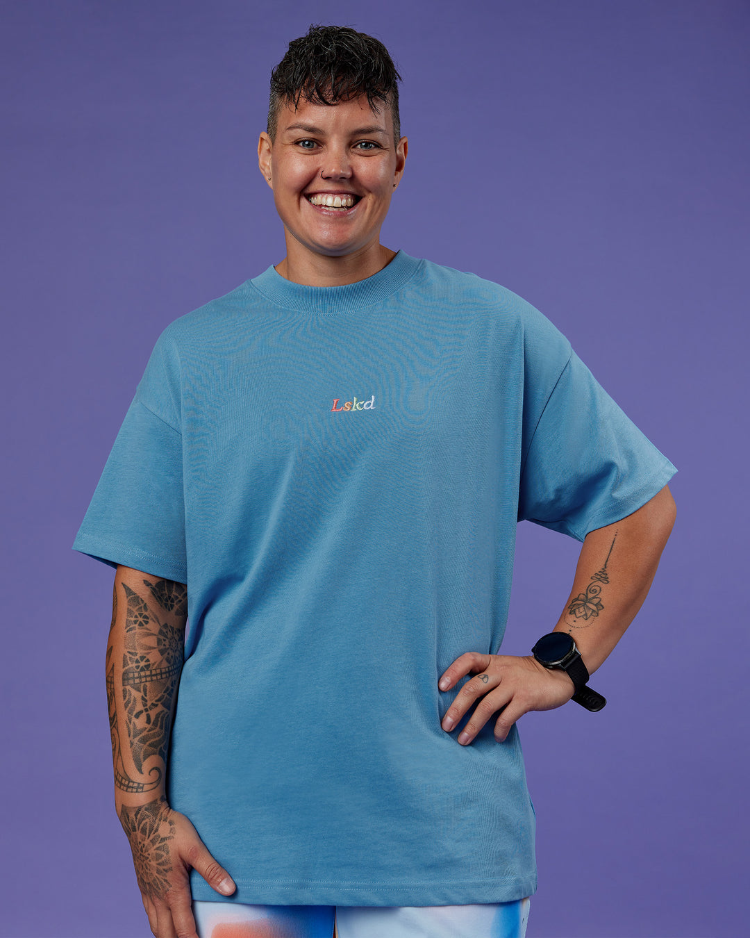 Model wearing Our Journey Heavyweight Oversized Tee - Azure Blue-Rainbow | Model:Em | Size:S
