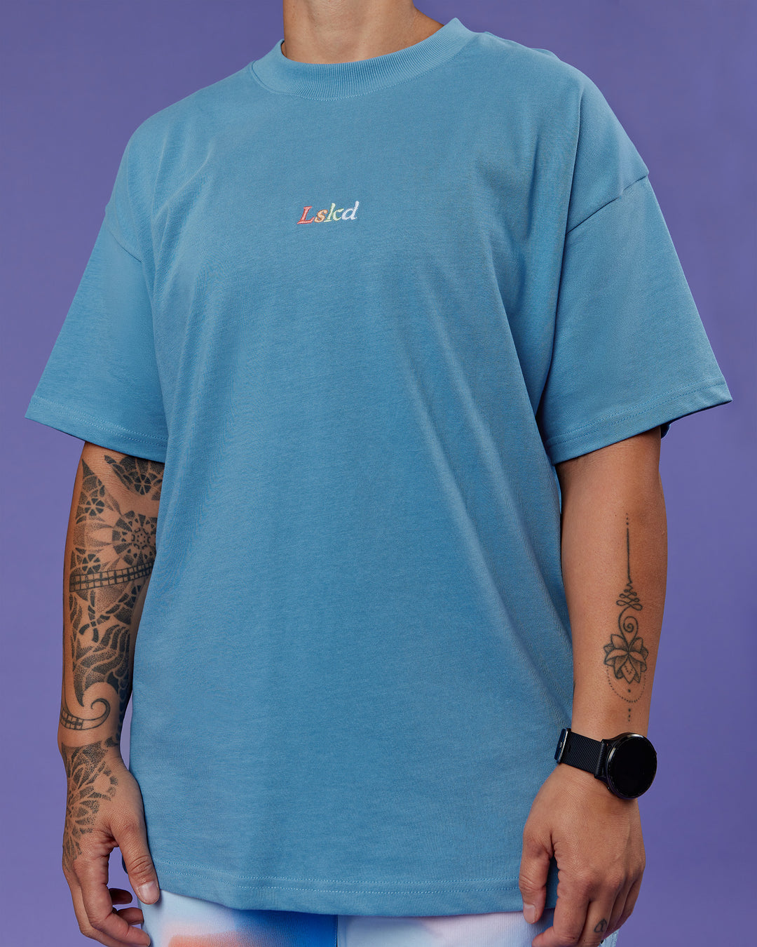 Model wearing Our Journey Heavyweight Oversized Tee - Azure Blue-Rainbow | Model:Em | Size:S