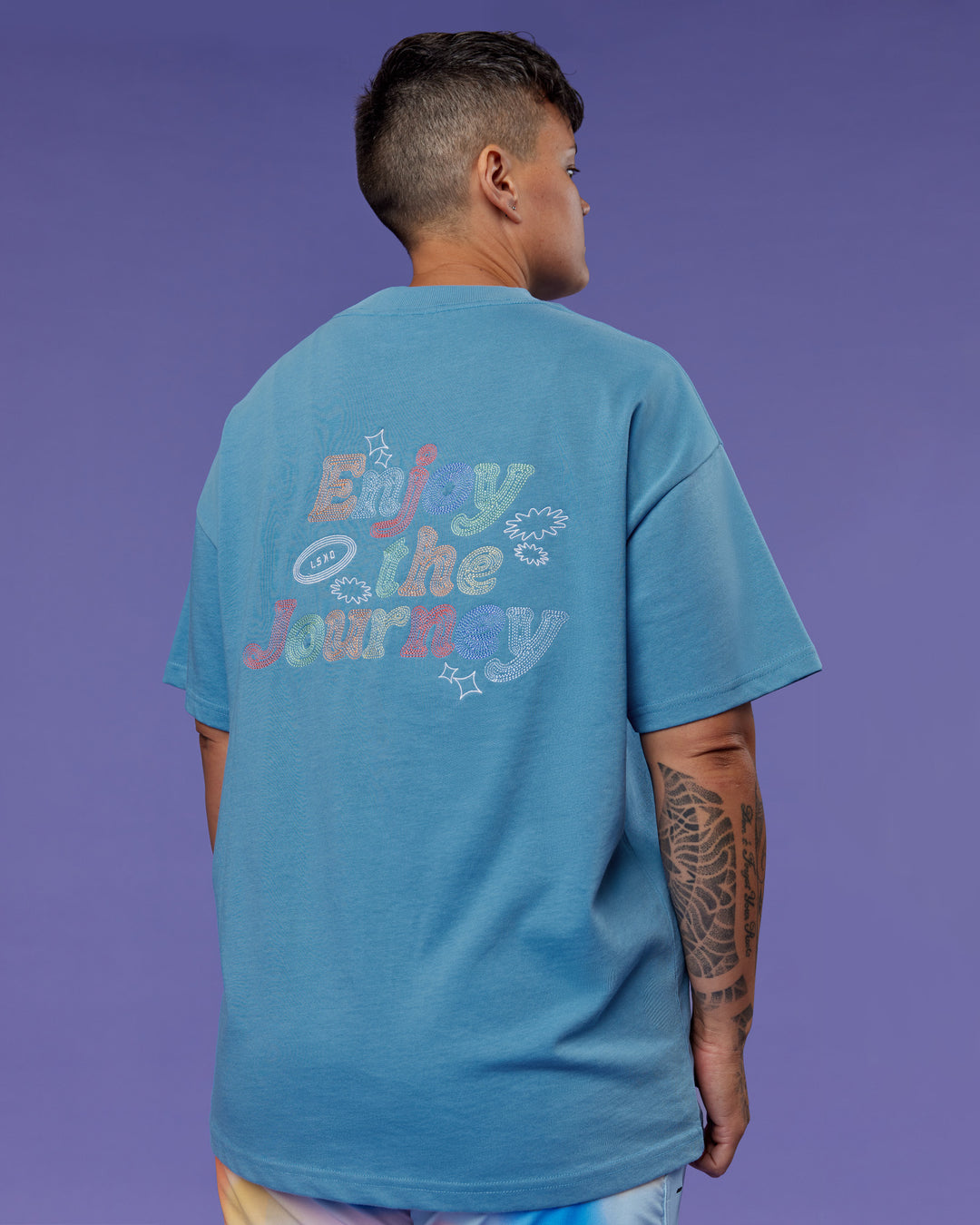 Model wearing Our Journey Heavyweight Oversized Tee - Azure Blue-Rainbow | Model:Em | Size:S