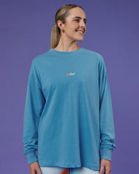 Woman wearing Our Journey Oversize Heavyweight FLXCotton Long Sleeve Tee - Azure Blue | Model:Mon | Size:S