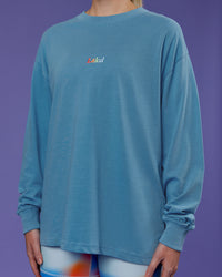 Woman wearing Our Journey Oversize Heavyweight FLXCotton Long Sleeve Tee - Azure Blue | Model:Mon | Size:S