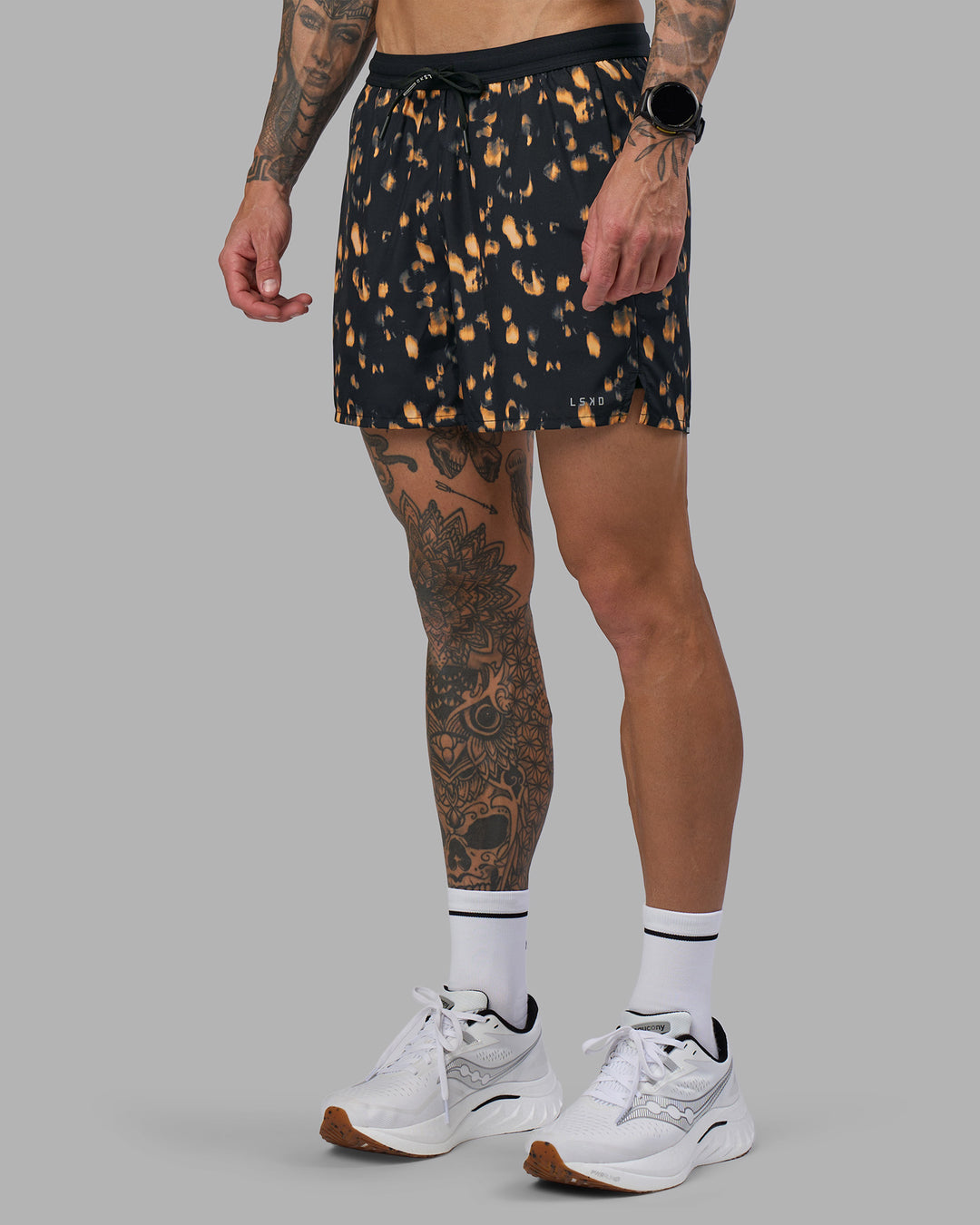 Man wearing Pace 5" Lined Running Short - Markings Black Print | Model:Tommy | Size:S