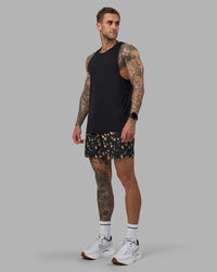 Man wearing Pace 5" Lined Running Short - Markings Black Print | Model:Tommy | Size:S