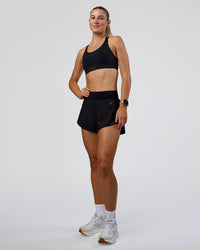 Woman wearing Pacer 3" Run Short - Black | Model:Emelia | Size:S