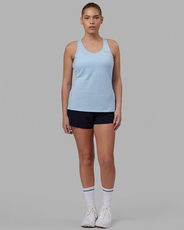 Woman wearing Perform VapourFLX Tank - Windsurfer Marl