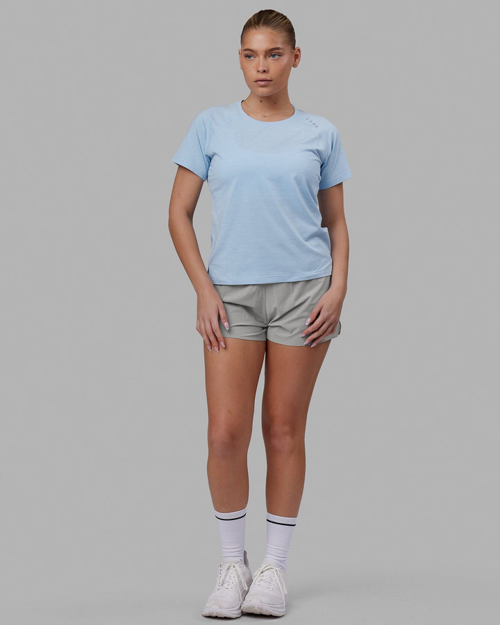 Woman wearing Perform VapourFLX Tee - Windsurfer Marl