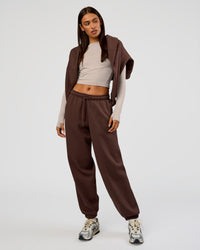 Woman wearing Post Train Hoodie - Hot Chocolate | Model:Ruby | Size:S