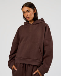 Woman wearing Post Train Hoodie - Hot Chocolate | Model:Ruby | Size:S