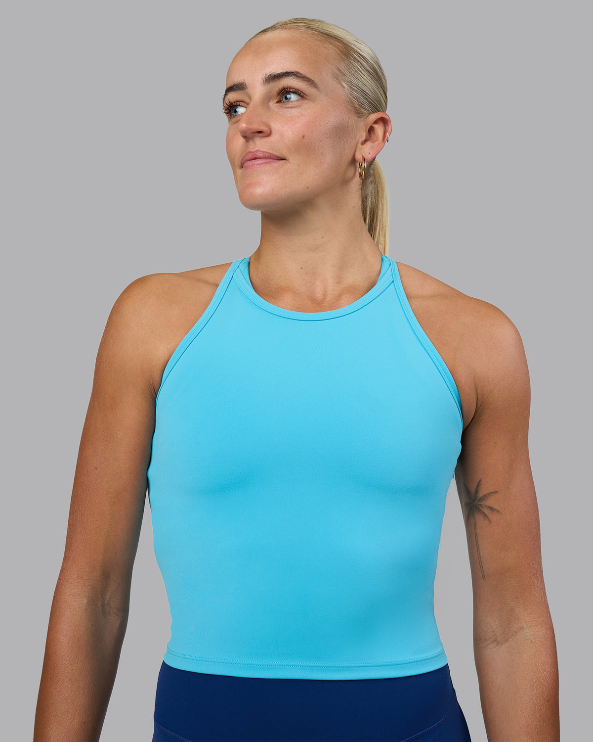 Woman wearing Power Performance Tank - Blue Atoll | Model:Katie | Size:S