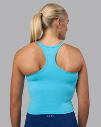 Woman wearing Power Performance Tank - Blue Atoll | Model:Katie | Size:S