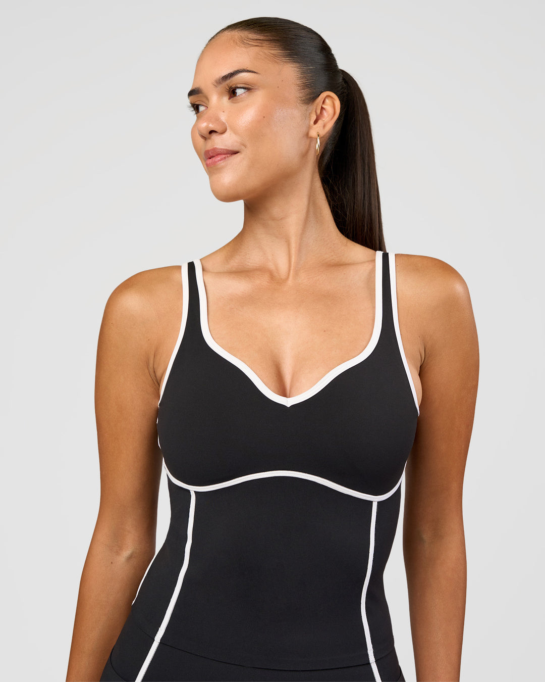 Woman wearing Power Sweetheart Shelf Bra Tank - Black | Model:Rhiley | Size:S
