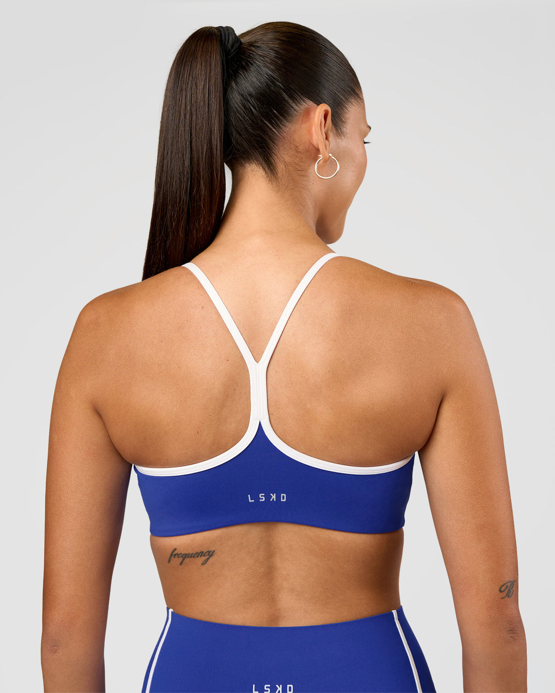 Woman wearing Power Sweetheart Sports Bra - Electric Indigo | Model:Charli | Size:XS
