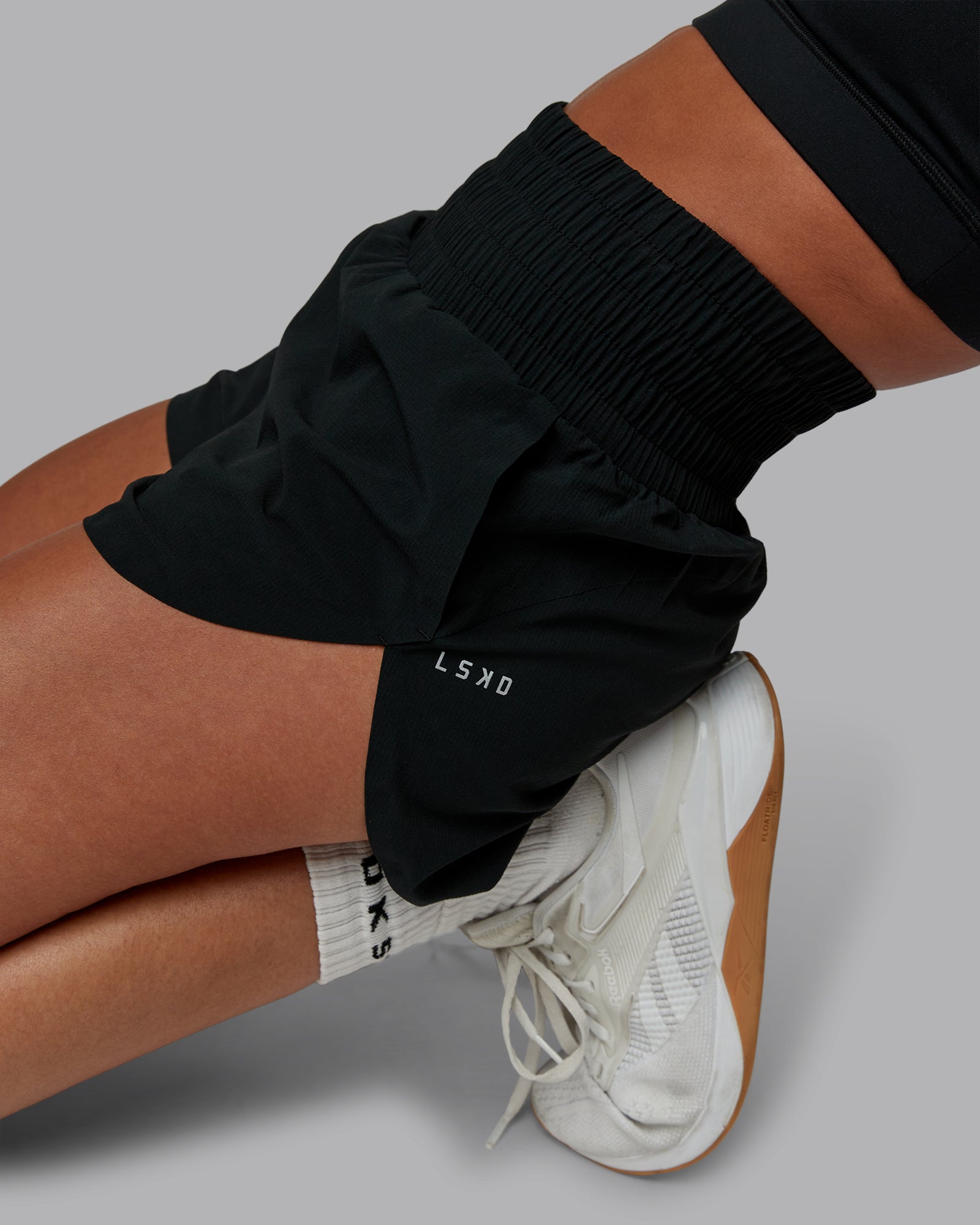 Woman wearing Power Train 2" Short - Black | Model:Tylah | Size:S