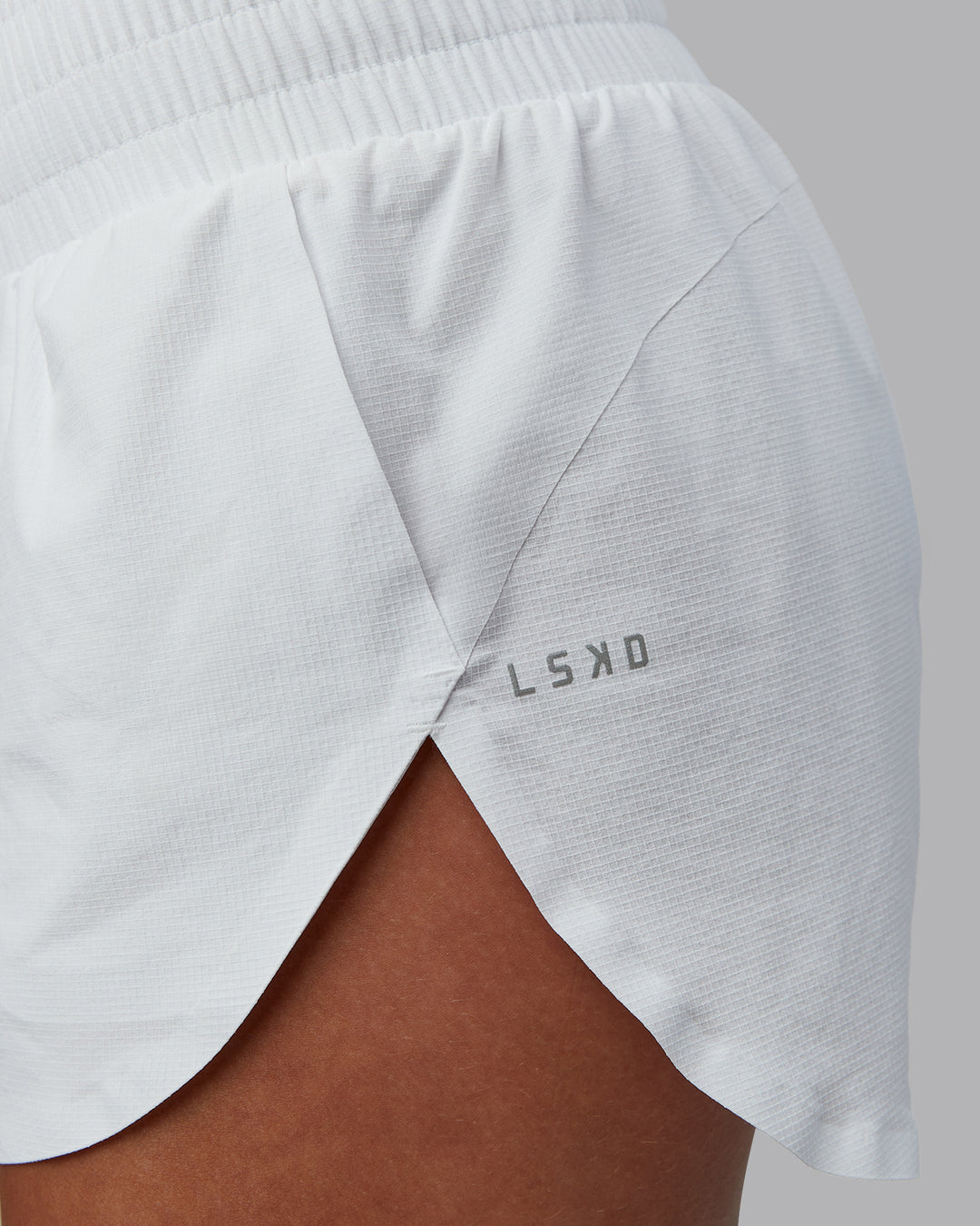 Woman wearing Power Train 2&quot; Short - White | Model:Tylah | Size:S