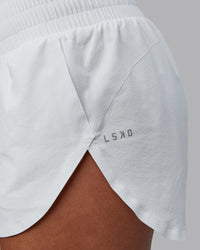 Woman wearing Power Train 2" Short - White | Model:Tylah | Size:S