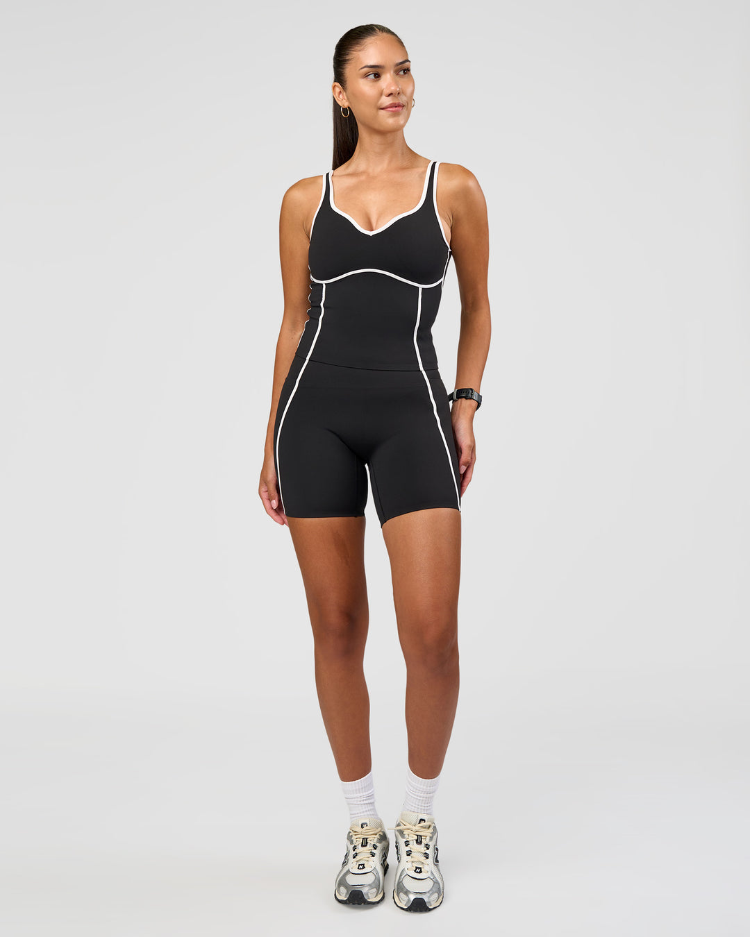 Woman wearing Power Ultra High-Rise 6" Short Pockets - Black | Model:Rhiley | Size:S