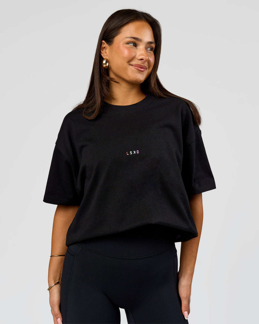 Woman wearing Pride Sticker Boxy Tee - Black | Model:Bianca | Size:S