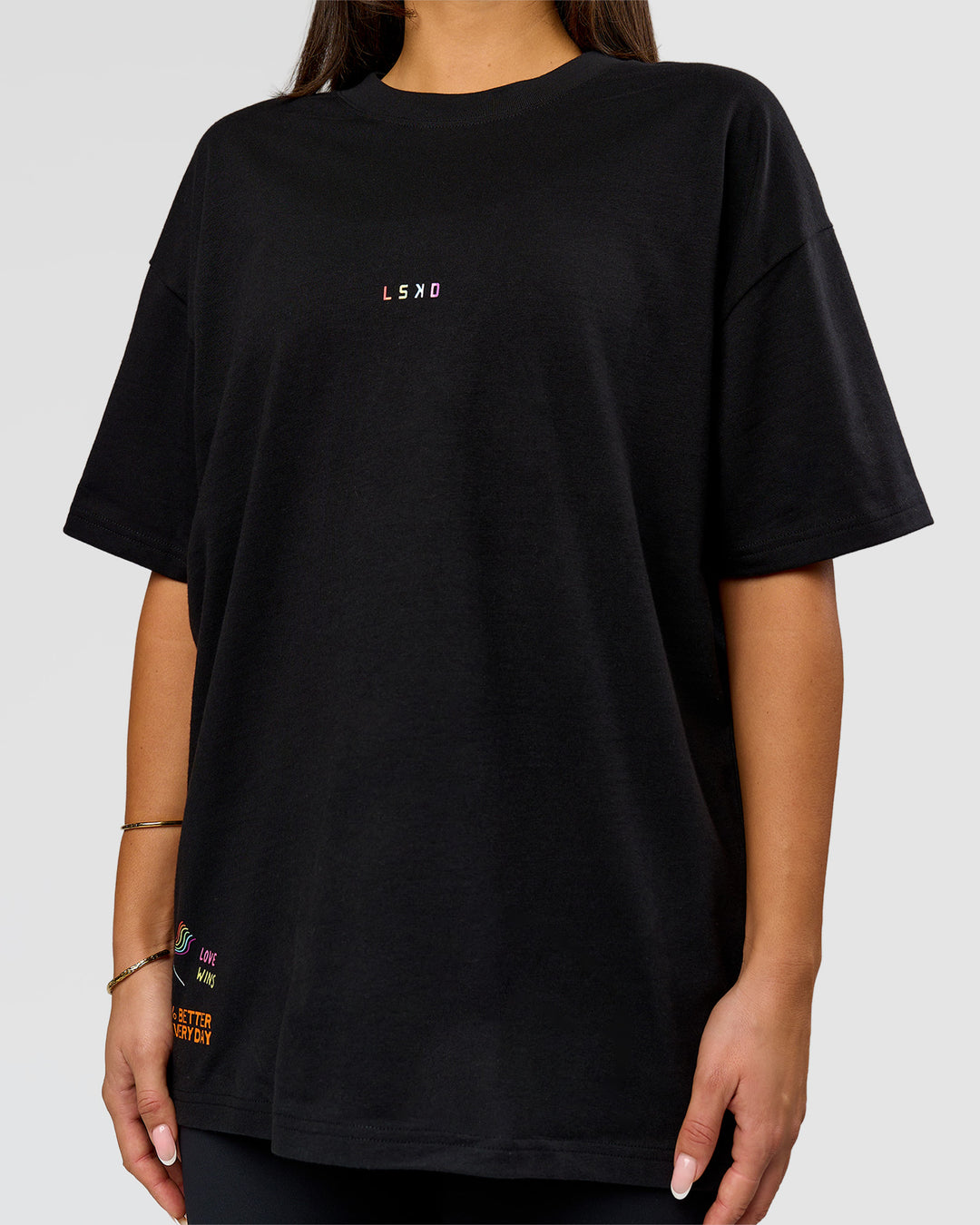 Woman wearing Pride Sticker Boxy Tee - Black | Model:Bianca | Size:S