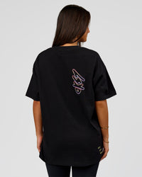 Woman wearing Pride Sticker Boxy Tee - Black | Model:Bianca | Size:S