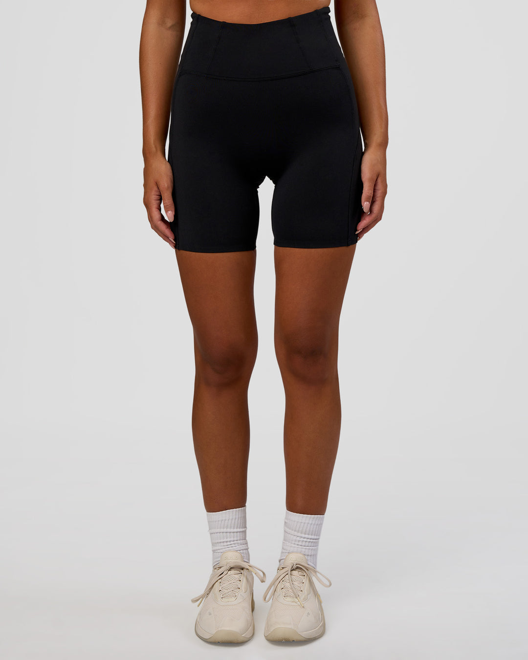 Woman wearing Progression Ultra High-Rise 6" Short - Black | Model:Kirstyn | Size:S