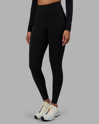 Woman wearing Progression Ultra High-Rise Full Length Legging - Black | Model:Rhiley | Size:S