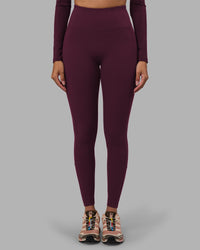 Woman wearing Progression Ultra High-Rise Full Length Legging - Cherry Lacquer| Model:Rhiley | Size:S