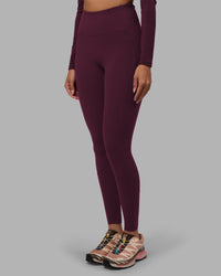 Woman wearing Progression Ultra High-Rise Full Length Legging - Cherry Lacquer| Model:Rhiley | Size:S