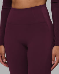 Woman wearing Progression Ultra High-Rise Full Length Legging - Cherry Lacquer| Model:Rhiley | Size:S