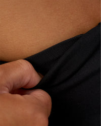 Woman wearing Progression Ultra High-Rise 4" Short - Black | Model:Kirstyn | Size:S