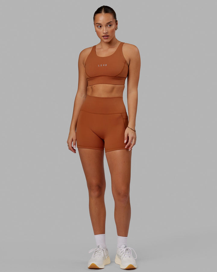 Woman wearing Propel Sports Bra - Hazel