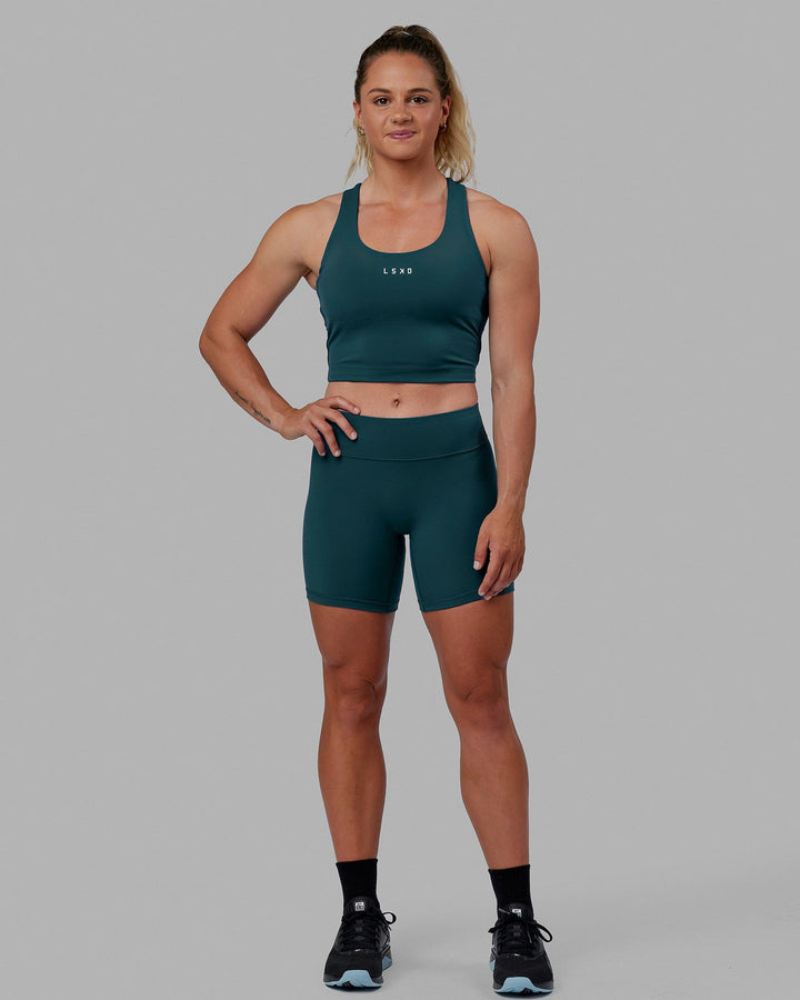 Woman wearing Pulse Active Tank - Tidal Teal